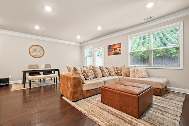 living area featuring visible vents, crown molding, dark wood finished floors, baseboards, and recessed lighting