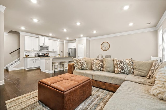 living area with stairs, recessed lighting, baseboards, dark wood-type flooring, and ornamental molding
