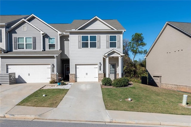 view of front facade featuring a front lawn and a garage