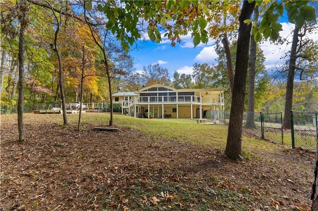 back of property featuring a sunroom