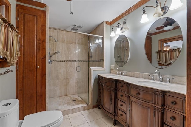 bathroom featuring an enclosed shower, ornamental molding, vanity, tile patterned flooring, and toilet