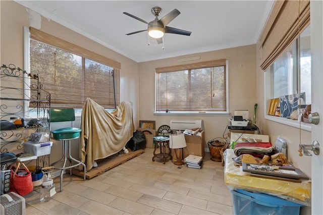 misc room featuring a wealth of natural light and crown molding