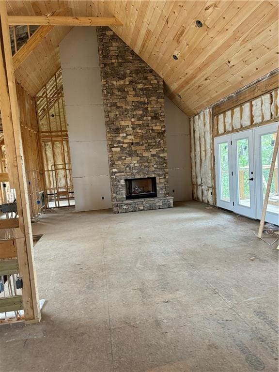 unfurnished living room with a fireplace, high vaulted ceiling, and wooden ceiling