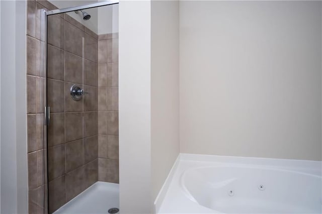 bathroom with independent shower and bath