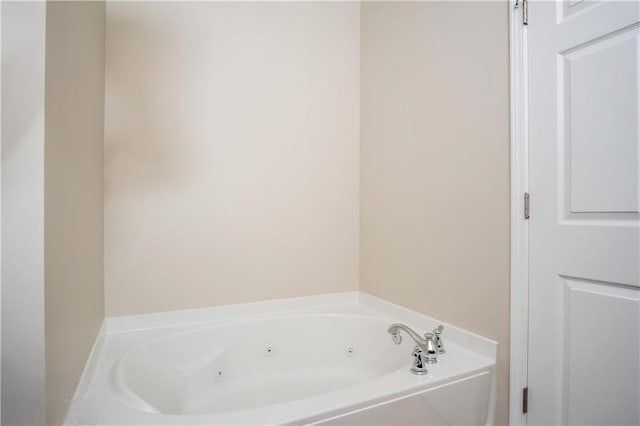 bathroom with a washtub