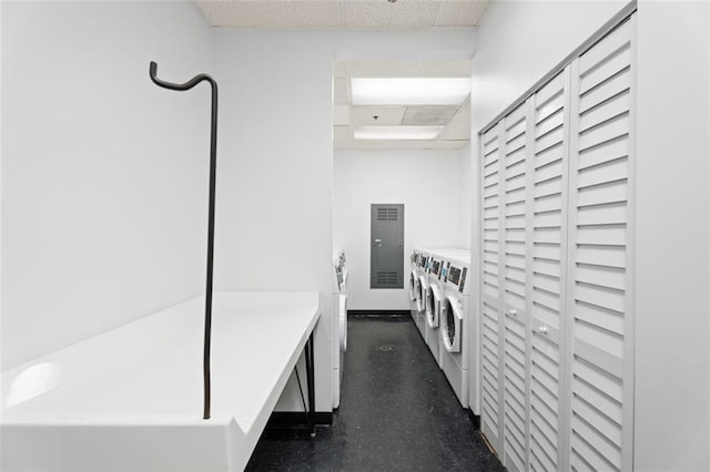795 Hammond Dr Unit 505, Atlanta, GA 30328 - hall with separate washer and dryer and a drop ceiling