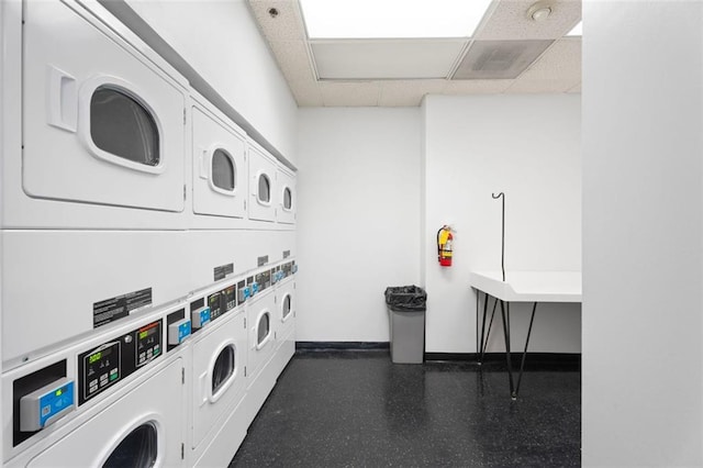 795 Hammond Dr Unit 505, Atlanta, GA 30328 - communal laundry room with estacked washer and dryer, independent washer and dryer, and baseboards