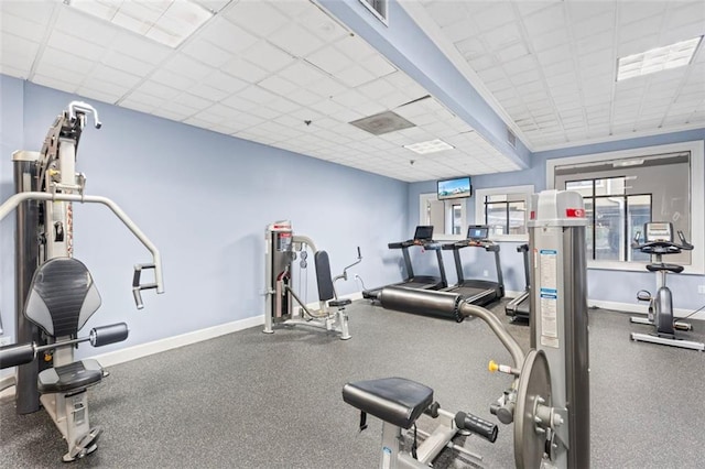 795 Hammond Dr Unit 505, Atlanta, GA 30328 - exercise room featuring a drop ceiling and baseboards