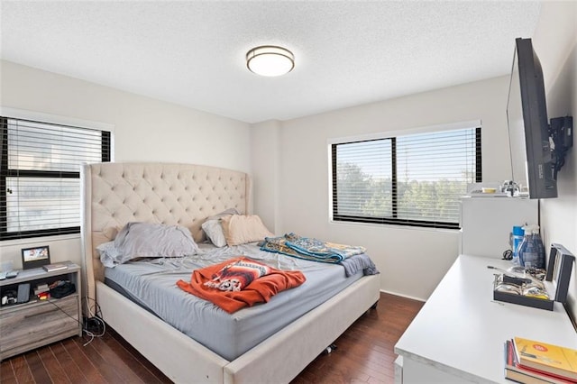 795 Hammond Dr Unit 505, Atlanta, GA 30328 - bedroom with multiple windows and dark wood finished floors