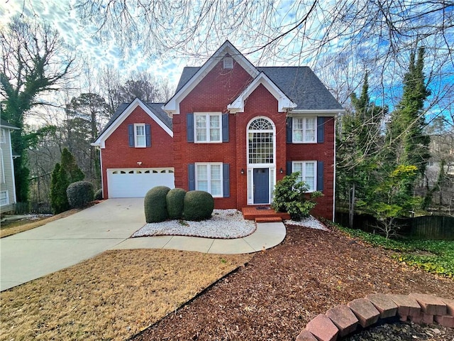 view of front of property with a garage