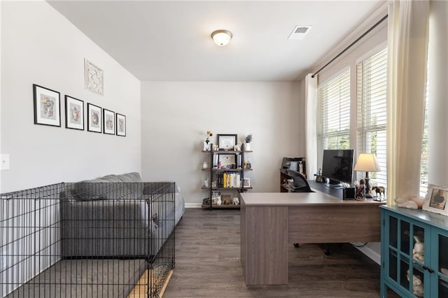 home office featuring dark hardwood / wood-style flooring