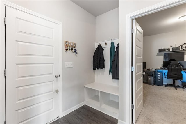 mudroom with light colored carpet