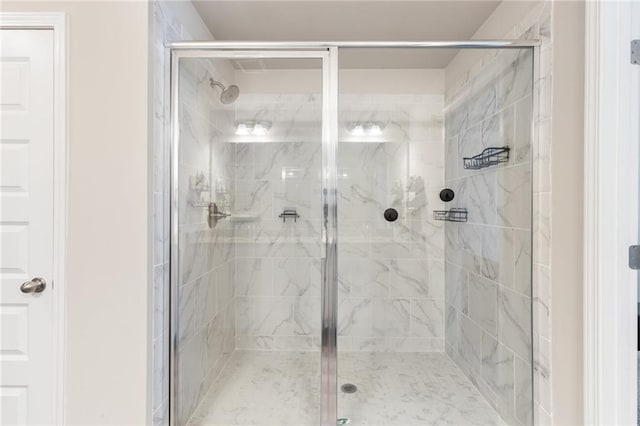 bathroom with an enclosed shower