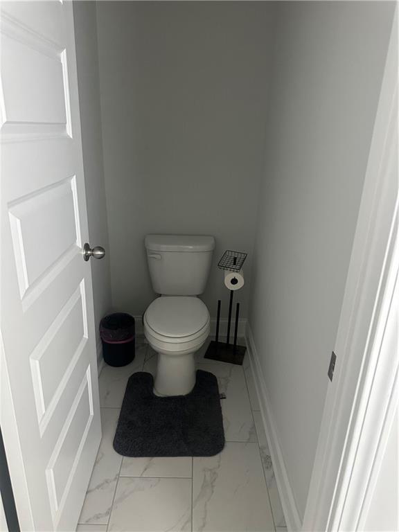 495 Sterling Creek Way, Loganville, GA 30052 - spacious closet with carpet floors