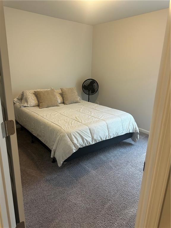 495 Sterling Creek Way, Loganville, GA 30052 - washroom with independent washer and dryer and dark wood-style floors