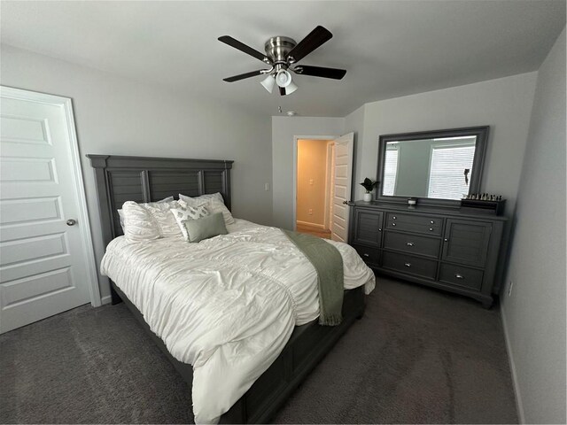495 Sterling Creek Way, Loganville, GA 30052 - bedroom with dark carpet and ceiling fan