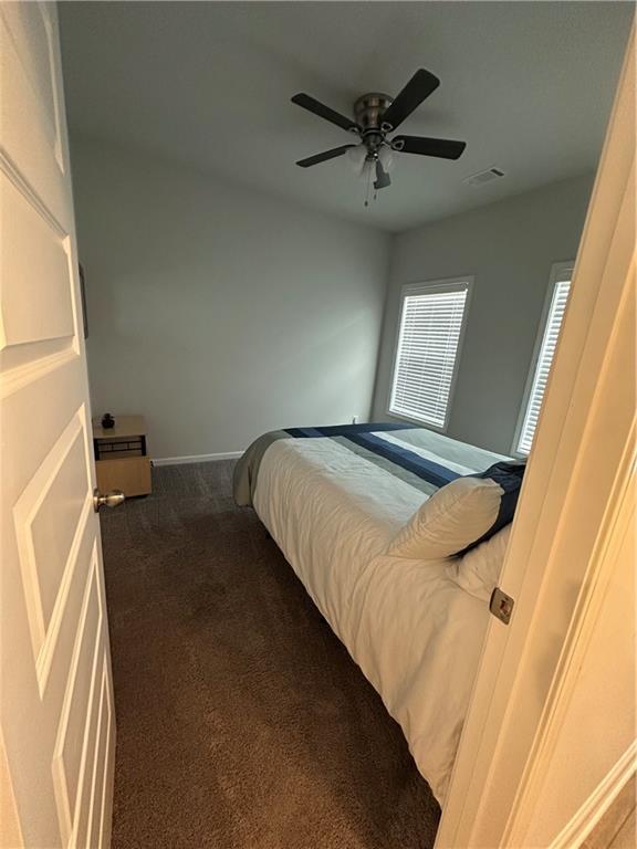 495 Sterling Creek Way, Loganville, GA 30052 - bathroom featuring wood finished floors and double vanity