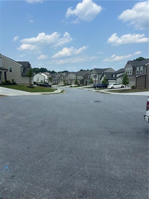 495 Sterling Creek Way, Loganville, GA 30052 - view of asphalt street with a residential view and curbs