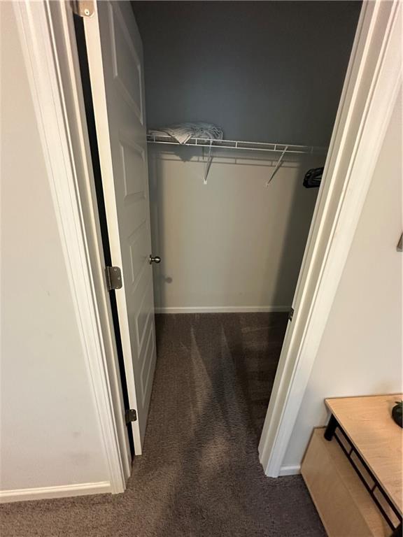495 Sterling Creek Way, Loganville, GA 30052 - carpeted bedroom featuring baseboards and ceiling fan