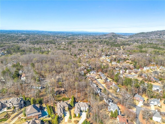 4080 Glen Hill Way NE, Marietta, GA 30066 - aerial view of property and surrounding area with nearby suburban area and a heavily wooded area