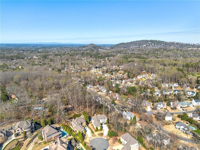 4080 Glen Hill Way NE, Marietta, GA 30066 - aerial view of property and surrounding area featuring nearby suburban area and a heavily wooded area