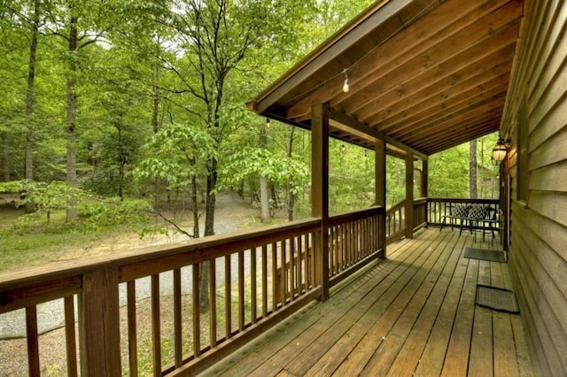 deck with a forest view
