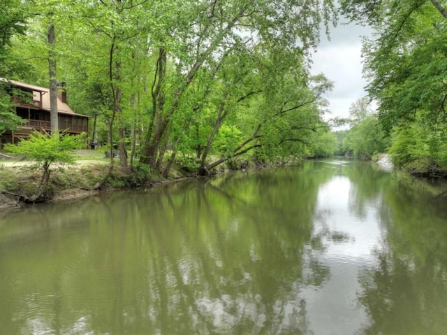 property view of water with a view of trees