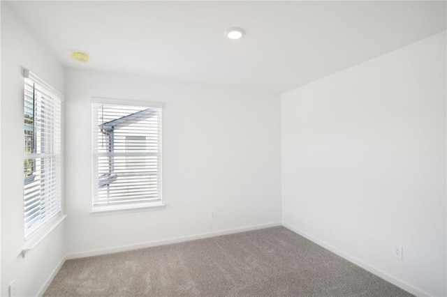 view of carpeted spare room