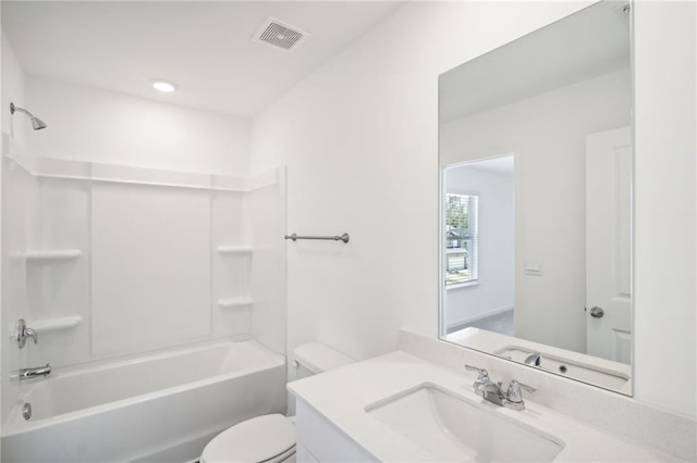 full bathroom with vanity, shower / tub combination, and toilet