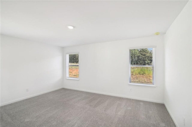 view of carpeted spare room