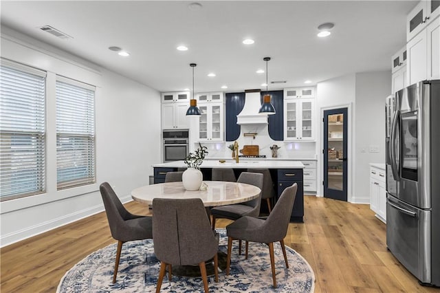 2013 White Cypress Ct, Smyrna, GA 30082 - dining area featuring light wood-style floors, recessed lighting, and baseboards
