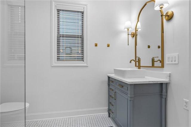 2013 White Cypress Ct, Smyrna, GA 30082 - bathroom with baseboards, vanity, toilet, and tile patterned floors