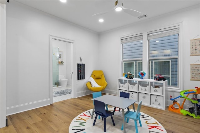 2013 White Cypress Ct, Smyrna, GA 30082 - recreation room with wood finished floors, ornamental molding, a ceiling fan, recessed lighting, and baseboards