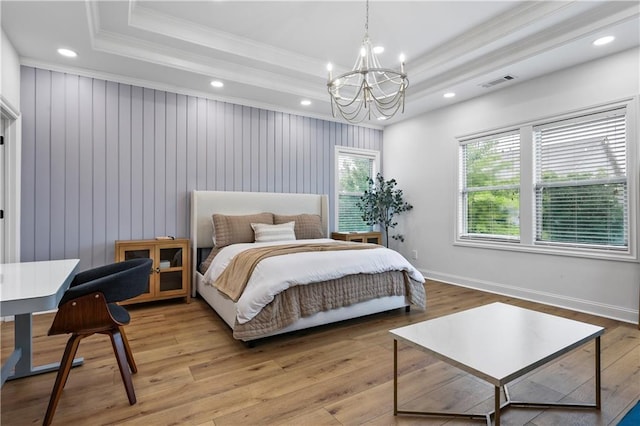 2013 White Cypress Ct, Smyrna, GA 30082 - bedroom featuring a chandelier, ornamental molding, a tray ceiling, light wood-style flooring, and recessed lighting