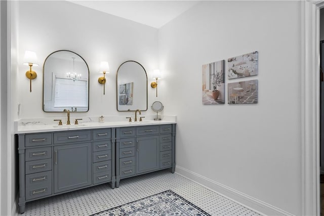 2013 White Cypress Ct, Smyrna, GA 30082 - bathroom featuring double vanity, baseboards, and a chandelier