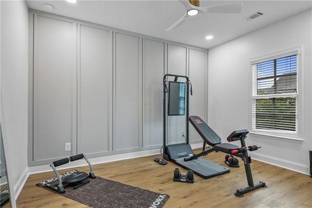 2013 White Cypress Ct, Smyrna, GA 30082 - workout area with a decorative wall, wood finished floors, baseboards, recessed lighting, and ceiling fan