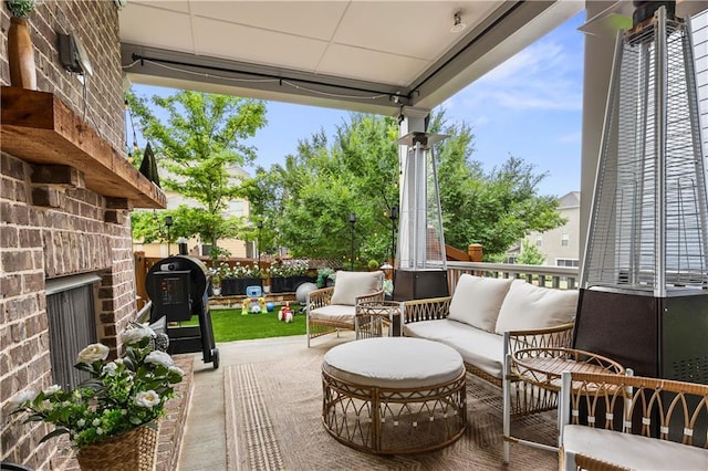 2013 White Cypress Ct, Smyrna, GA 30082 - view of patio with an outdoor living space with a fireplace