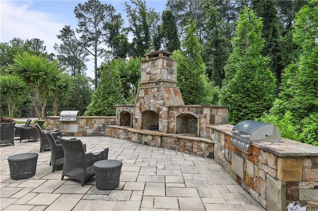 2013 White Cypress Ct, Smyrna, GA 30082 - view of patio / terrace with an outdoor stone fireplace