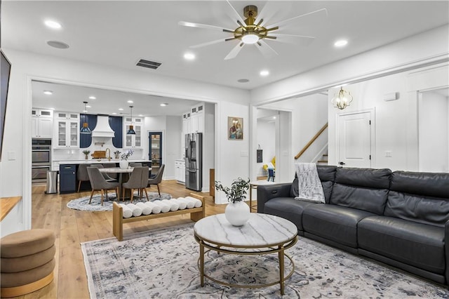2013 White Cypress Ct, Smyrna, GA 30082 - living room with a ceiling fan, stairway, light wood-style floors, and recessed lighting