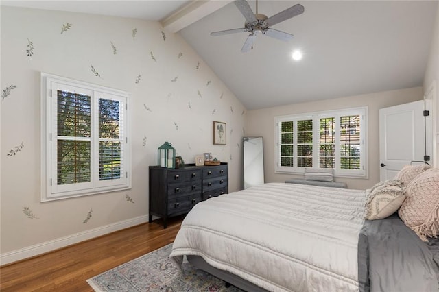 bedroom with wood finished floors, baseboards, and a ceiling fan