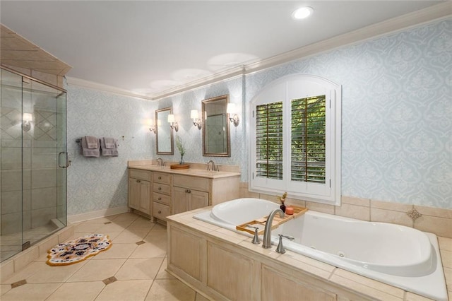 bathroom with crown molding, a garden tub, tile patterned flooring, a stall shower, and double vanity
