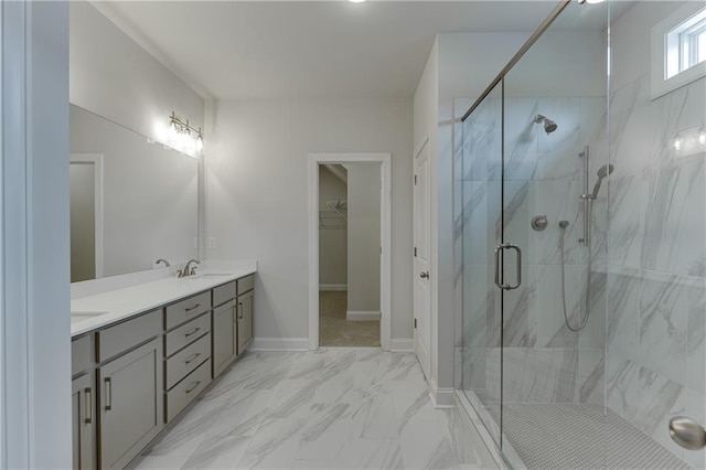 bathroom with an enclosed shower and vanity