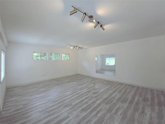 2821 NE Meadowlark Trl, Duluth, GA 30096 - empty room with wood finished floors