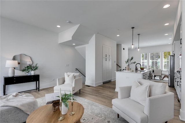 living room with light hardwood / wood-style floors