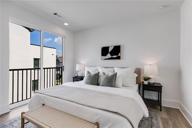 bedroom featuring hardwood / wood-style flooring