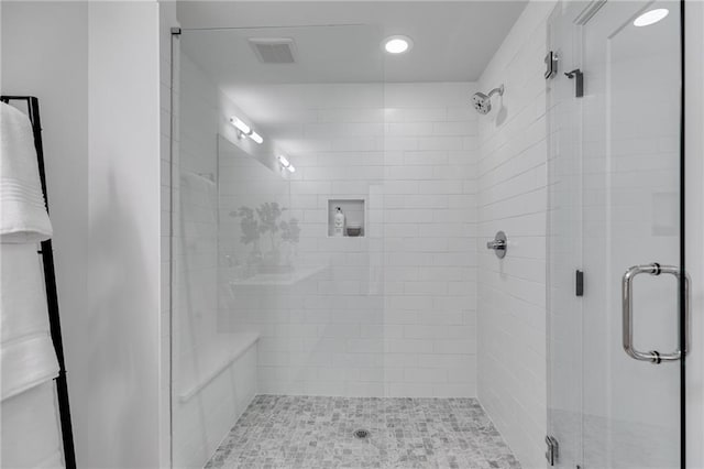 bathroom with walk in shower