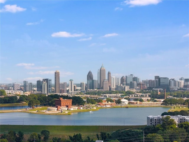 property's view of city featuring a water view