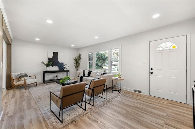 living room with light hardwood / wood-style floors