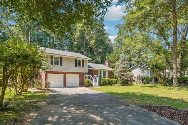 190 Windflower Trce, Roswell, GA 30075 - split level home featuring concrete driveway, brick siding, a front yard, a garage, and a chimney