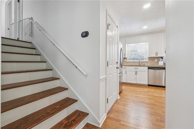 190 Windflower Trce, Roswell, GA 30075 - stairs featuring wood finished floors and recessed lighting